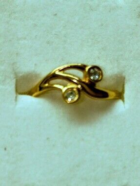 Avon Gold-Tone Wave Ring with Clear Stones